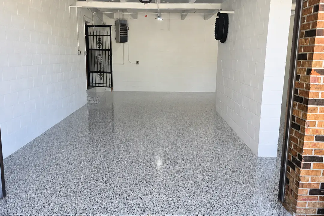 After: the same garage with a decorative flake coating