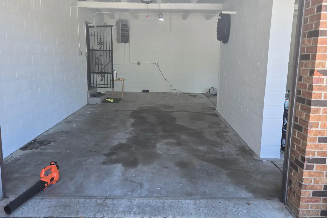 Before: an unfinished concrete garage floor